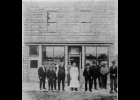 THIS PICTURE was taken of the building which stood where the Schultz Pharmacy was located. The date of the photo is unknown. Pictured (l to r) are B. Eseltine, Cadareau, H. Bangle, unknown, Ed Turmell, H. Yanna, unknown, J. Stay, Jim Hunter, and Geo. Clark. The photo was submitted to the Journal by Kenneth Shurlow, and was filed in our archives. --Journal File Photo